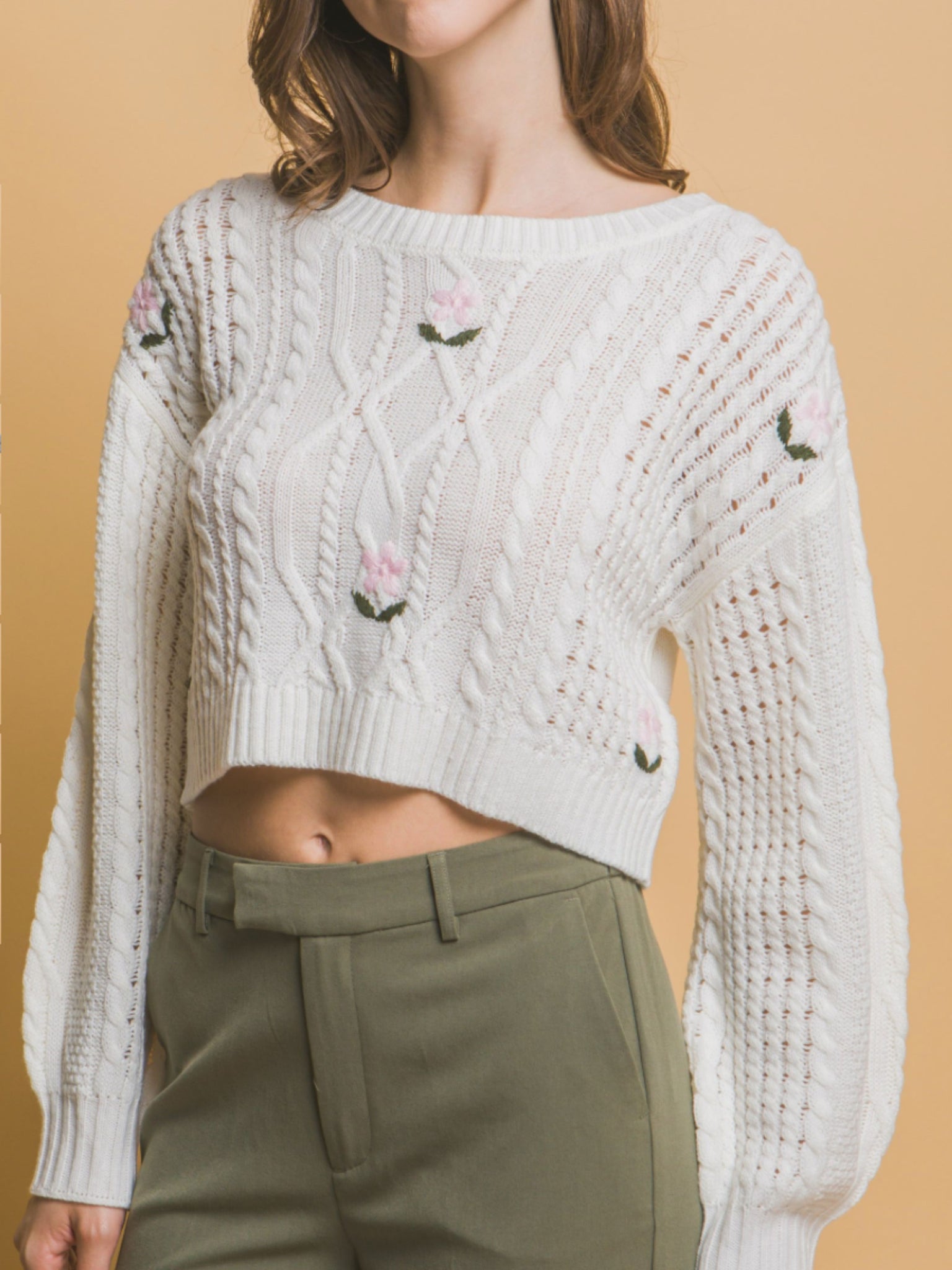 Bloom in white knitted sweater